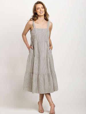 Light gray and white striped tiered dress with wide straps, designed with pockets and a timeless silhouette.
