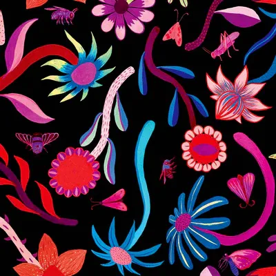 fabric pattern with large, bold floral designs in reds, blues, and oranges, styled with a flower crown and leaning casually against a weathered blue wall. Designed by Australian designer brand Streborclothing.