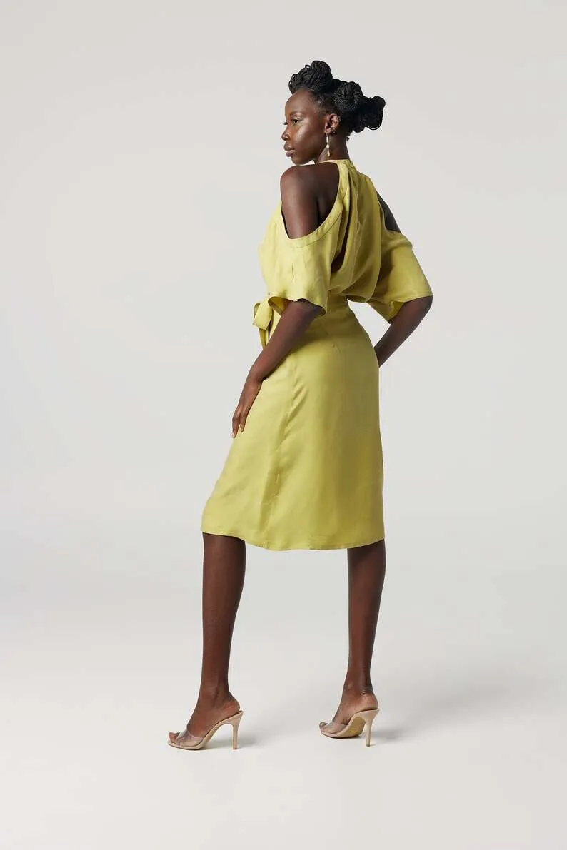 Yellow halter-neck dress: Minimalist cold-shoulder design with a waist tie for sustainable everyday elegance.