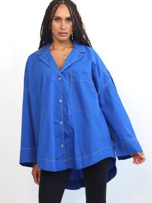 cobalt blue shirt featuring a relaxed drop-shoulder fit and a laid-back camp collar.